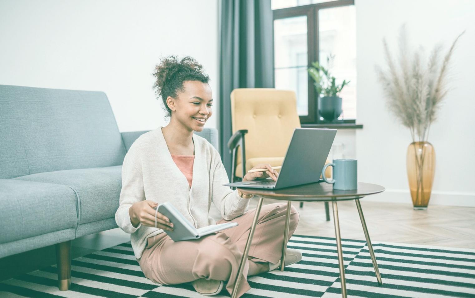 Student working on budget planning at a university library